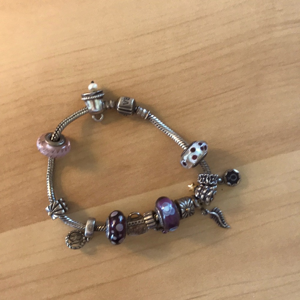 Pandora bracelet with charms.  Charms can be removed !